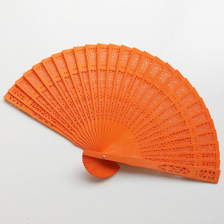 Ladies fan made of delicate plastic with artistic cut pattern Kalsten