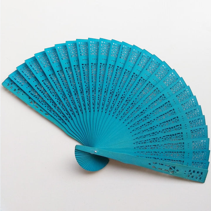 Ladies fan made of delicate plastic with artistic cut pattern Kalsten