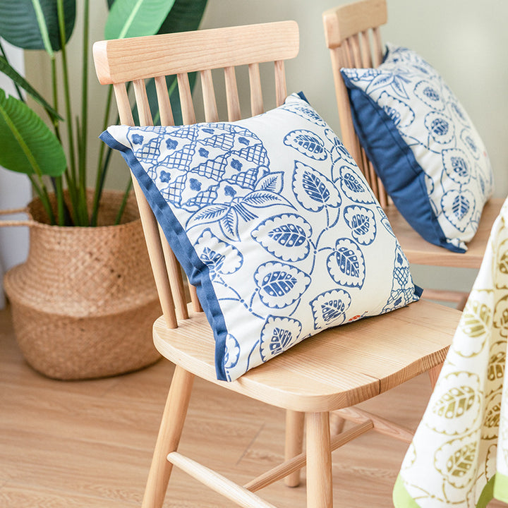 Square decorative cushion cover with botanical leaf print, cotton-linen mix and contrasting piped edge