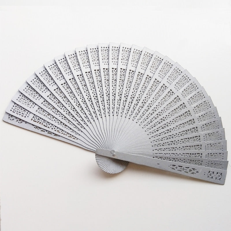 Ladies fan with intricate patterns and elegant laser engraving Kalsten