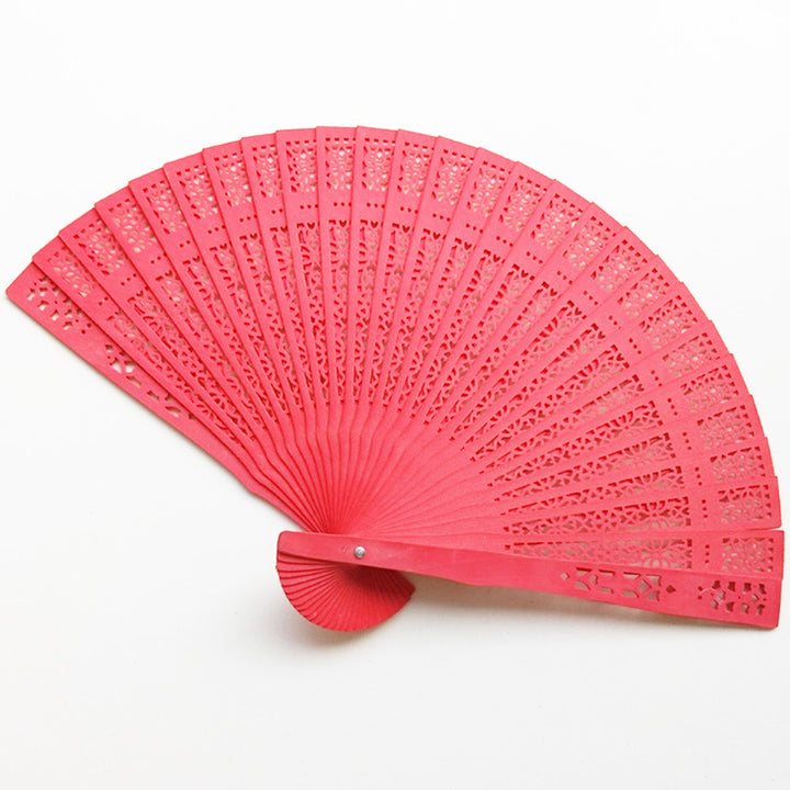 Ladies fan made of delicate plastic with artistic cut pattern Kalsten