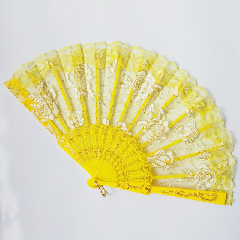 Ladies elegant fan made of sheer lace with floral embellishments Kalsten