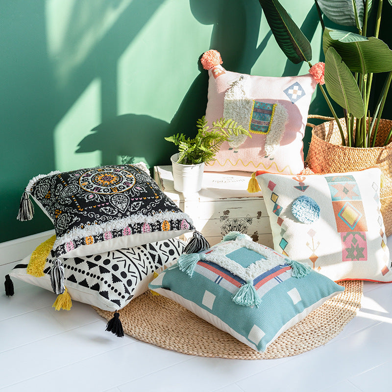 Square Boho decorative pillow with crocheted pom-pom and decorative corner tassels