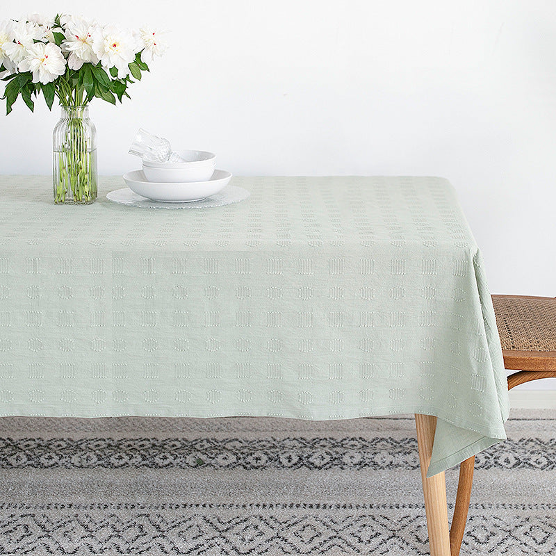 Tablecloth made of cotton blend with embossed square and circle relief Kalsten