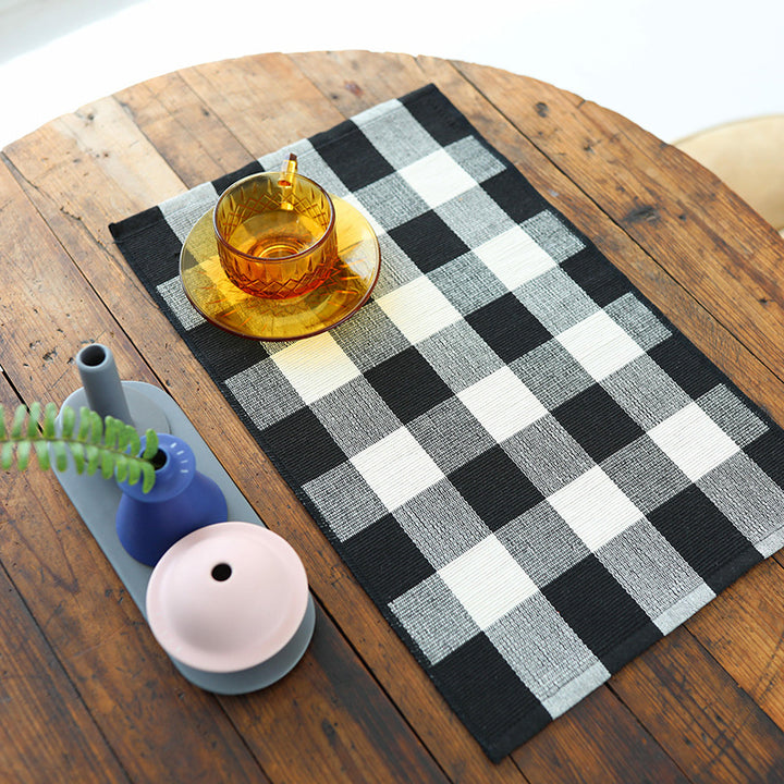 Striped table runner in buffalo check made of durable cotton blend
