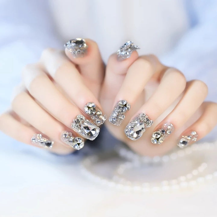 Nail art with glamorous rhinestone and glitter design Kalsten