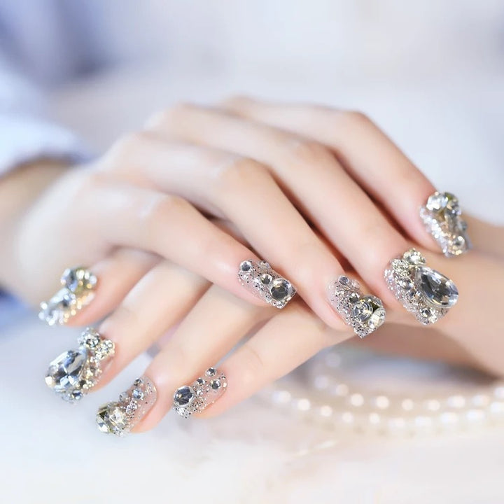 Nail art with glamorous rhinestone and glitter design Kalsten
