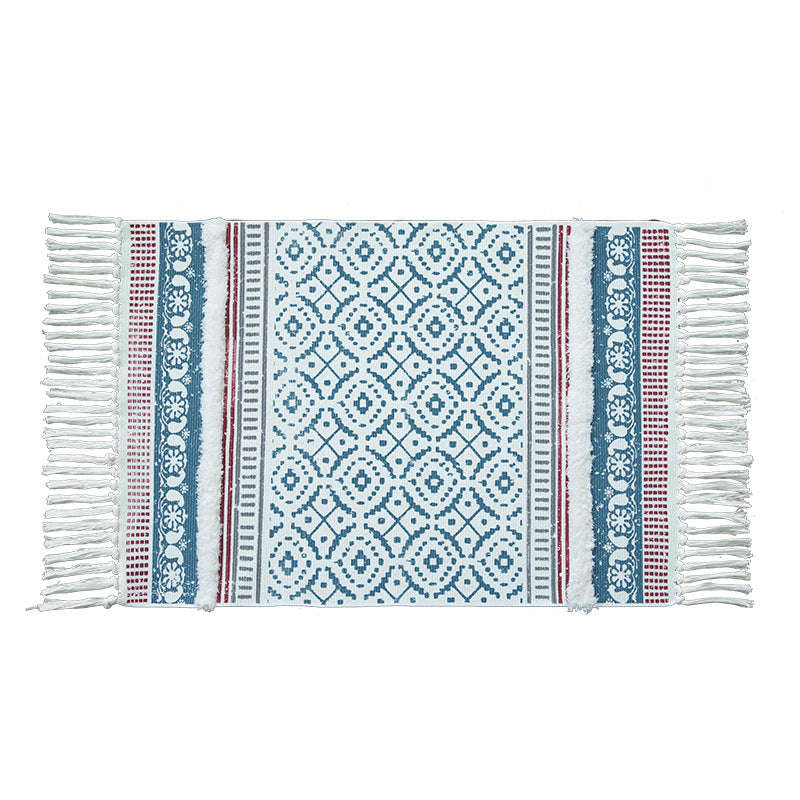 Handwoven cotton runner in Scandi-Boho style with fringes and geometric diamond jacquard Kalsten