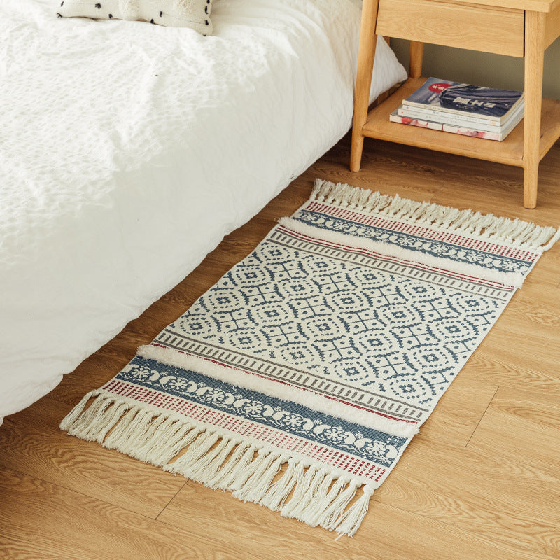 Handwoven cotton runner in Scandi-Boho style with fringes and geometric diamond jacquard Kalsten