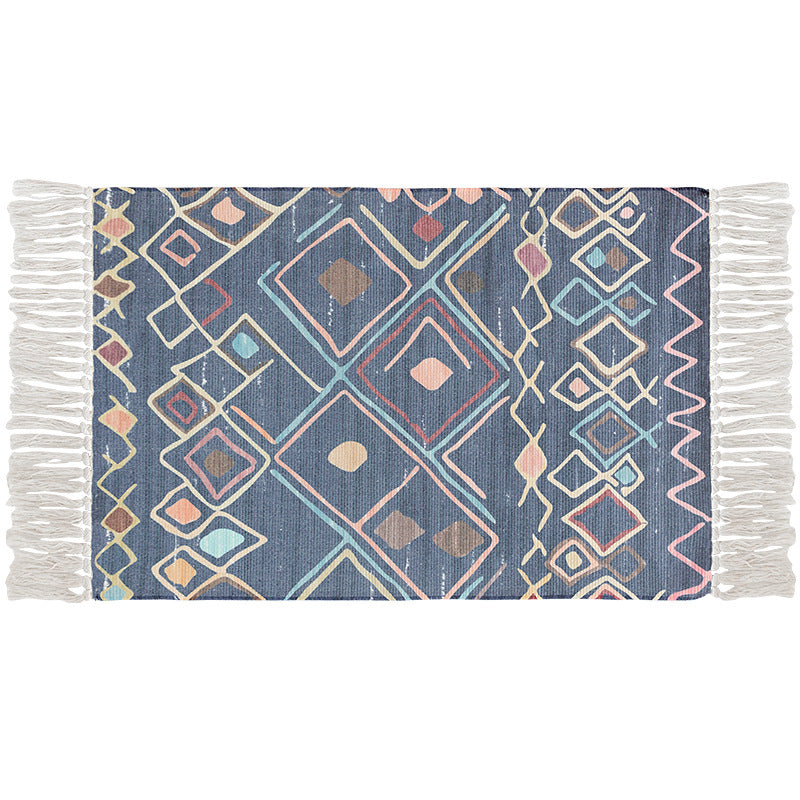 Flat-woven cotton runner with Boho-ethno pattern and fringed edge