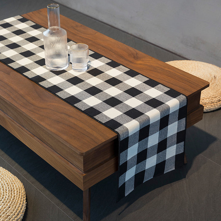 Striped table runner in buffalo check made of durable cotton blend