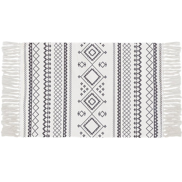 Flat-woven cotton runner with Boho-ethno pattern and fringed edge