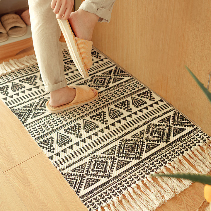 Flat-woven cotton runner in Boho-Tribal design with geometric diamond patterns and hand-fringed edge