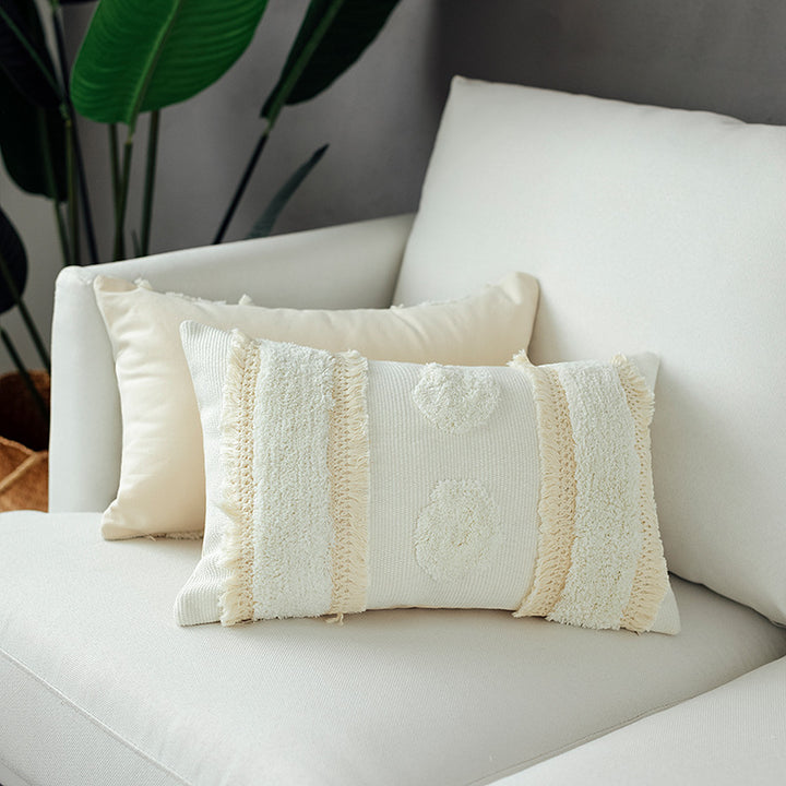 Decorative cushion cover with hand-tufted texture and fringe application