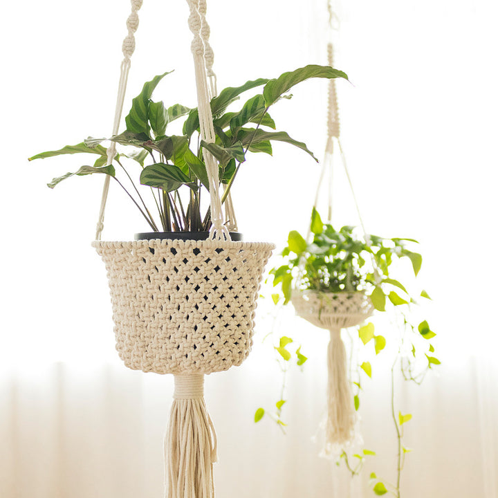 Macrame plant hanger made of cotton rope with tassels and adjustable suspension Kalsten