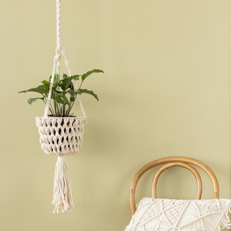 Macrame plant hanger made of cotton rope with tassels and adjustable suspension Kalsten