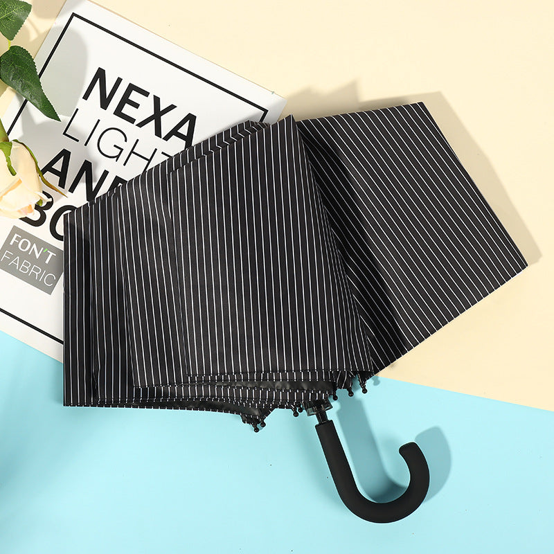Ladies practical and stylish folding umbrella with automatic opening mechanism Kalsten