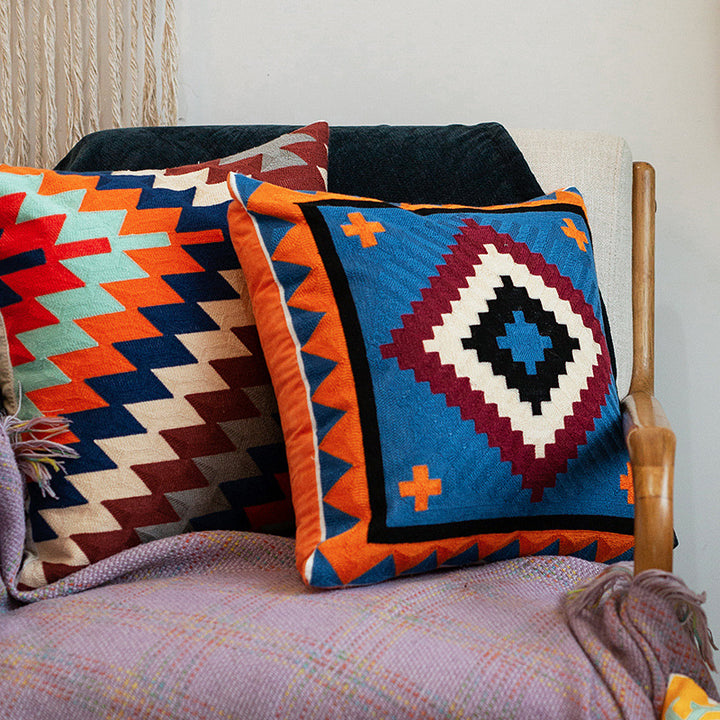 Woven decorative cushion cover with hand-tufted ethnic zigzag pattern