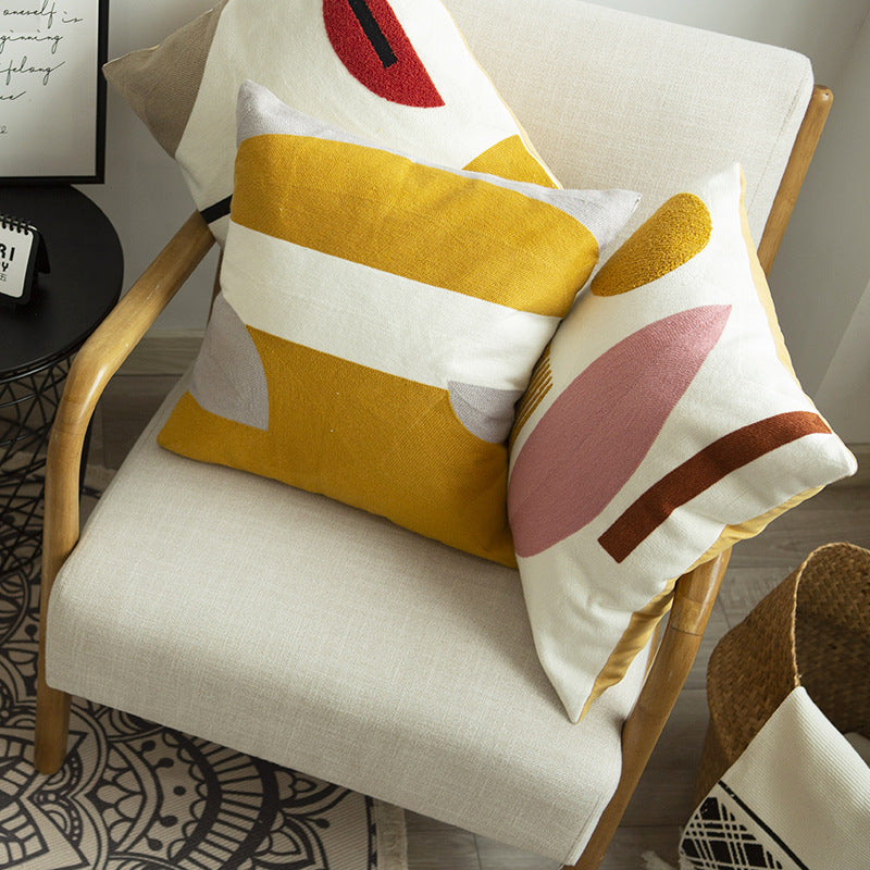 Geometric hand-tufted cotton cushion cover with textured appliqué