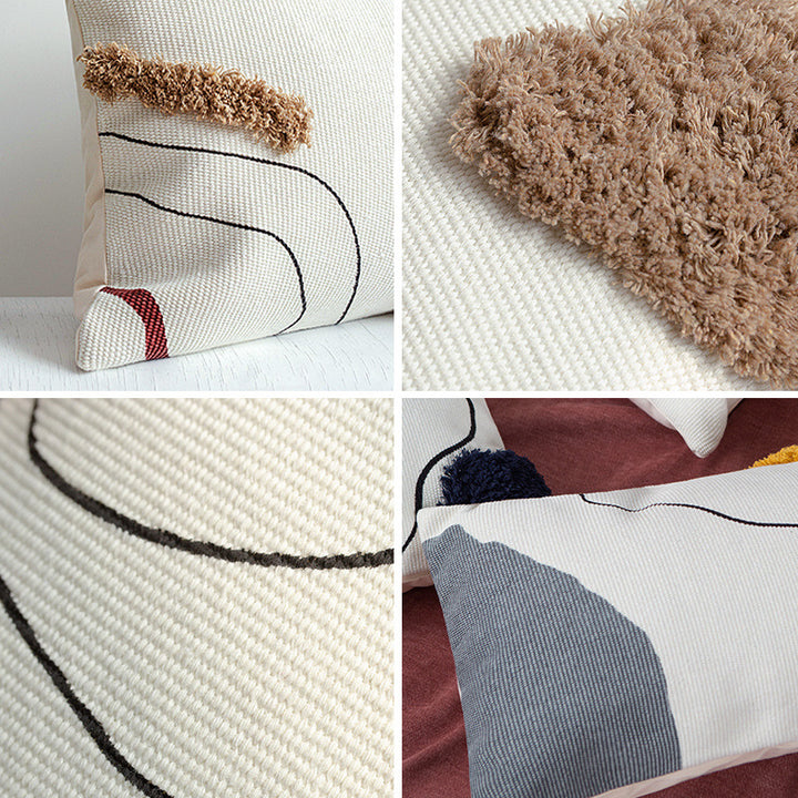 Woven decorative cushion cover in an abstract-minimalist Scandi look with hand-tufted applications