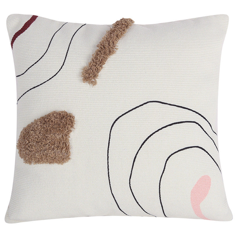 Woven decorative cushion cover in an abstract-minimalist Scandi look with hand-tufted applications