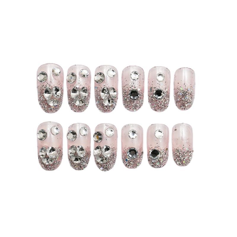 Sparkling artificial nails with rhinestones and sparkling accents Kalsten