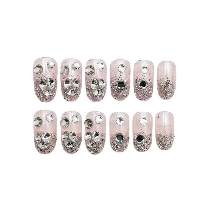 Sparkling artificial nails with rhinestones and sparkling accents Kalsten