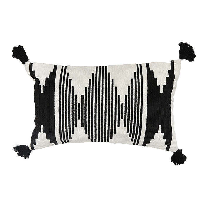 Rectangular woven cushion cover in ethnic jacquard with four tassels and concealed zipper