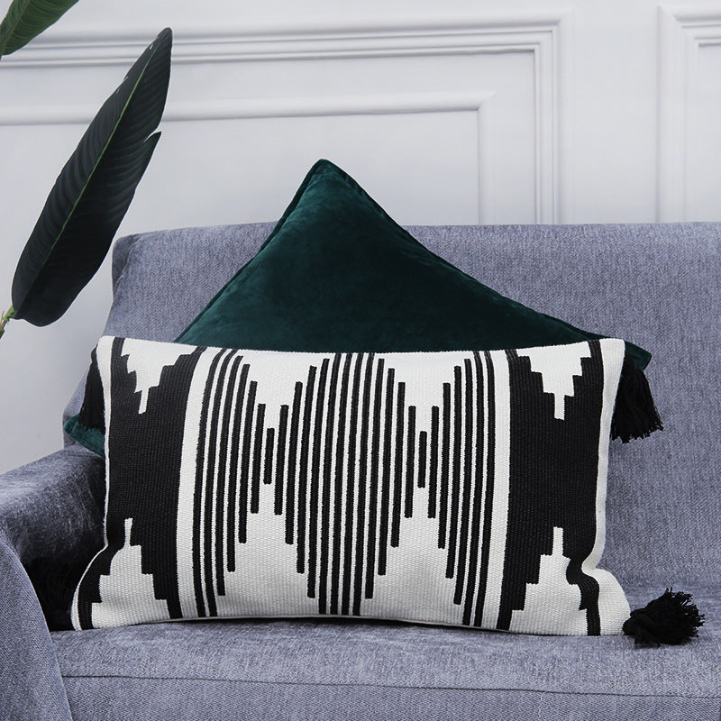 Rectangular woven cushion cover in ethnic jacquard with four tassels and concealed zipper