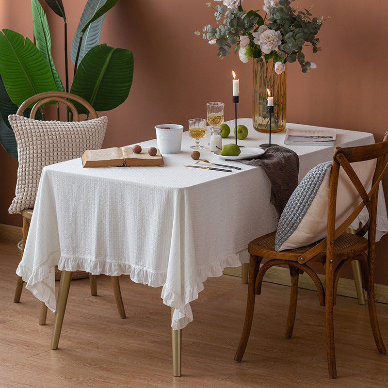 Rectangular tablecloth made of cotton waffle fabric with fine ruffle trim