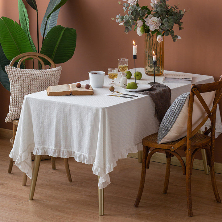 Rectangular tablecloth made of cotton waffle fabric with fine ruffle trim