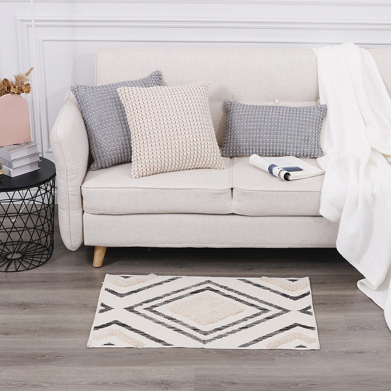 More modern flat-woven living room runner with diamond motif, low pile and contrasting tuft appliqué