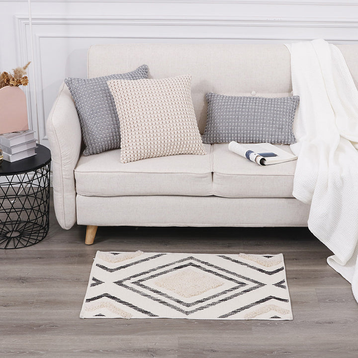 More modern flat-woven living room runner with diamond motif, low pile and contrasting tuft appliqué