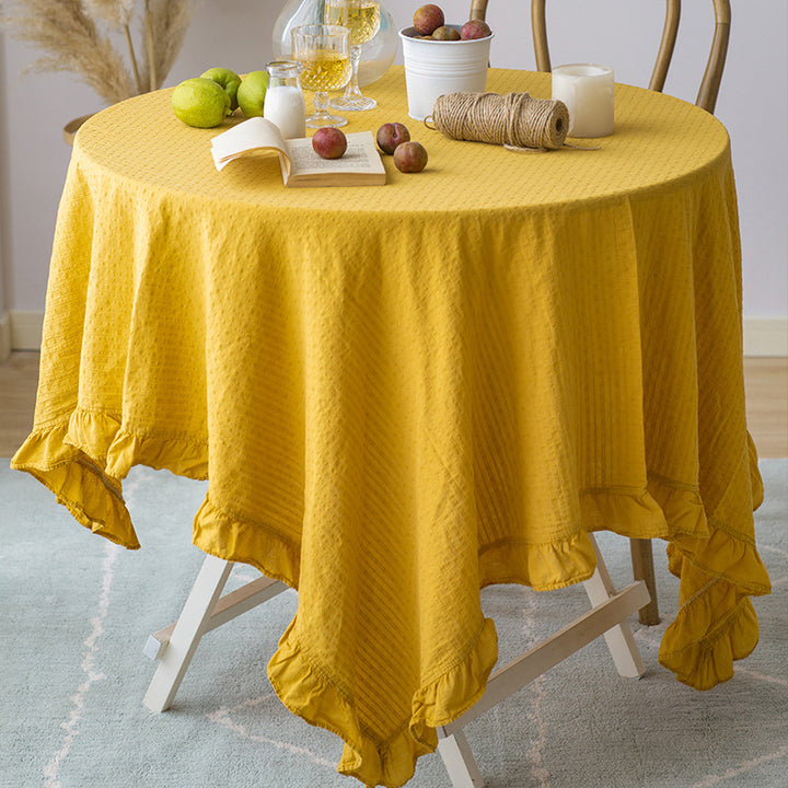 Rectangular tablecloth made of cotton waffle fabric with fine ruffle trim