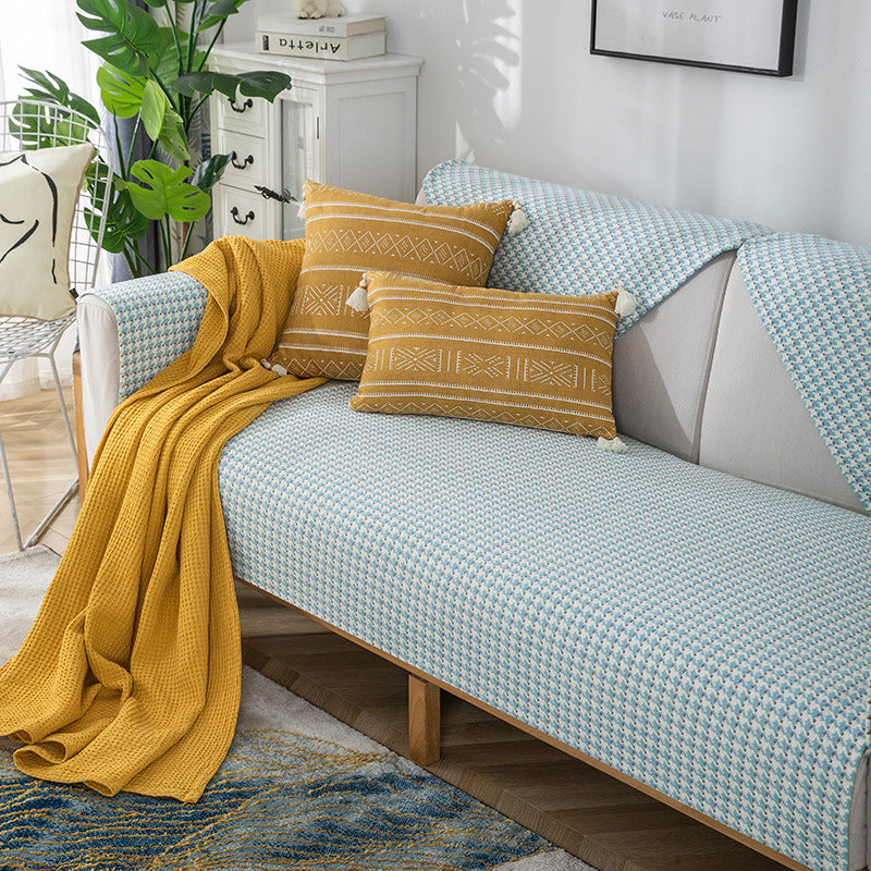 Sofa cover made of finely woven jacquard blend fiber with non-slip underside