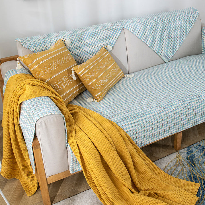 Sofa cover made of finely woven jacquard blend fiber with non-slip underside
