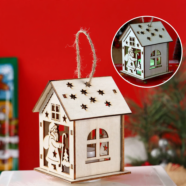 Illuminated wooden house as Christmas decoration