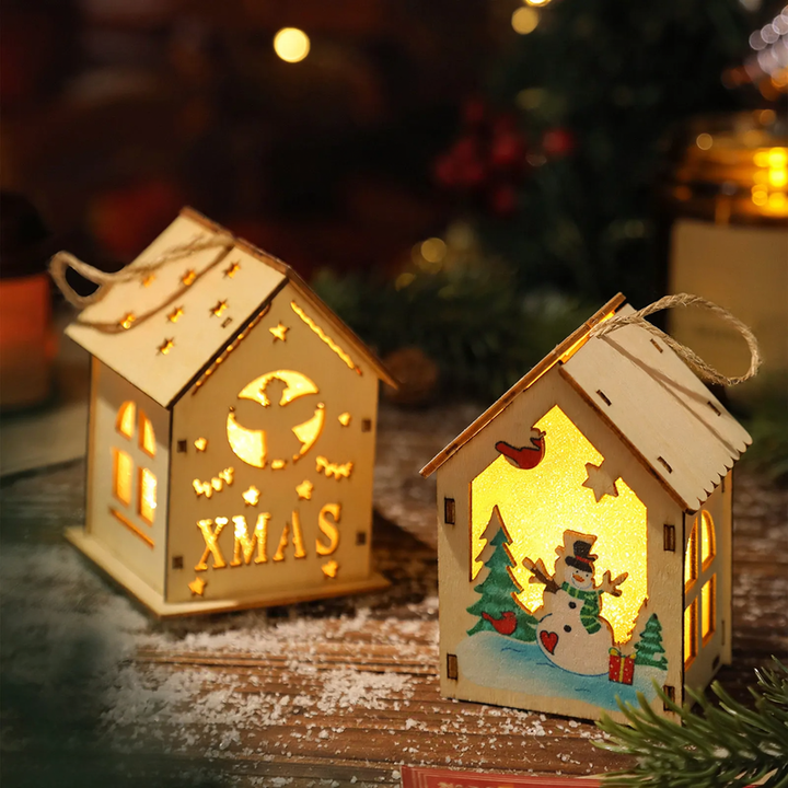 Illuminated wooden house for Christmas decoration