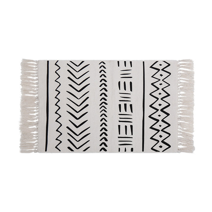 Flat-woven rug runner in Boho Mudcloth design with cotton fringes