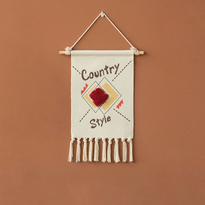 Decorative wall tapestry made of cotton with geometric ethnic pattern and tassels