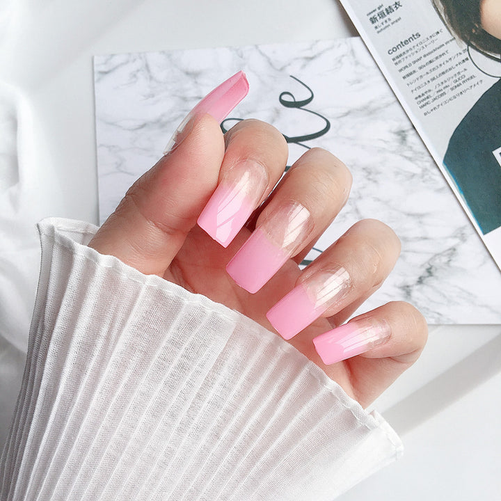 Artificial nails in modern French Tip design Kalsten