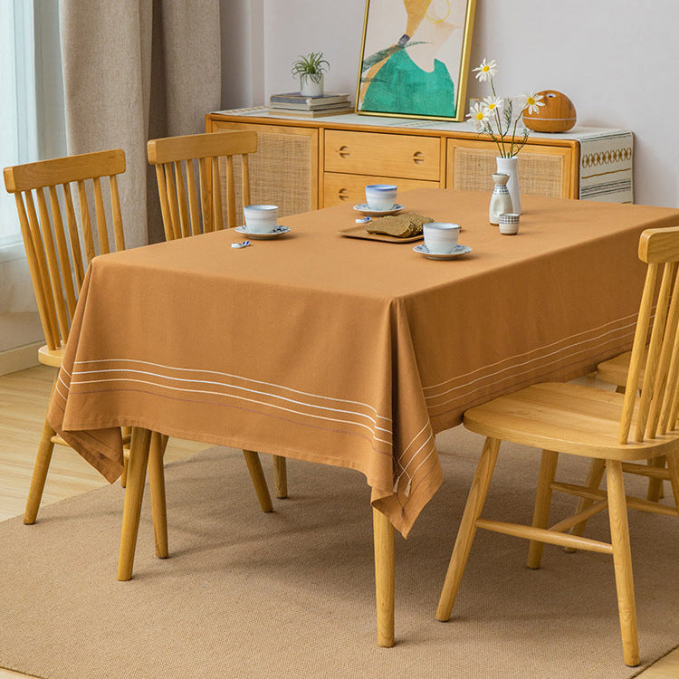 Rectangular tablecloth made of cotton-linen blend with fine embroidered stripe look and decorative tassels
