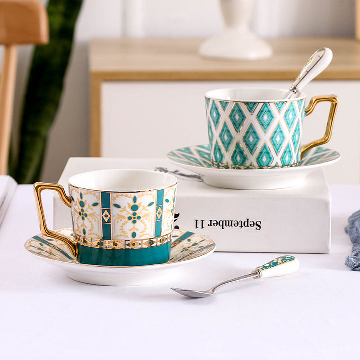 Elegant porcelain coffee cup set with saucers, spoons and delicate ornamental decoration