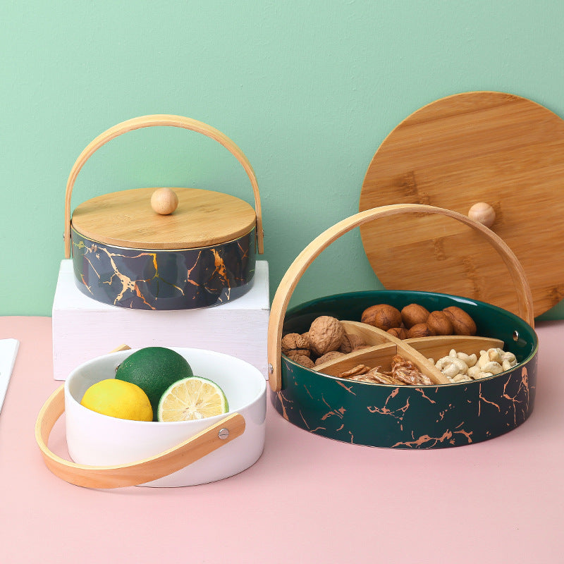 Kitchen organizer with bamboo handle and four-part insert, marbled snack bowl