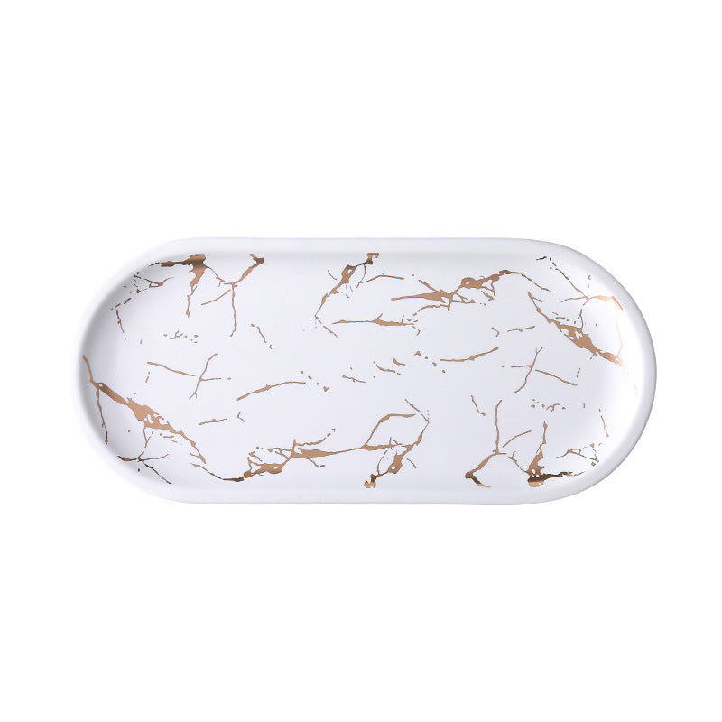Oval serving tray made of melamine with glossy marble look and raised edge