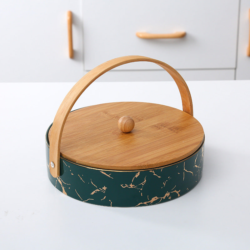 Kitchen organizer with bamboo handle and four-part insert, marbled snack bowl