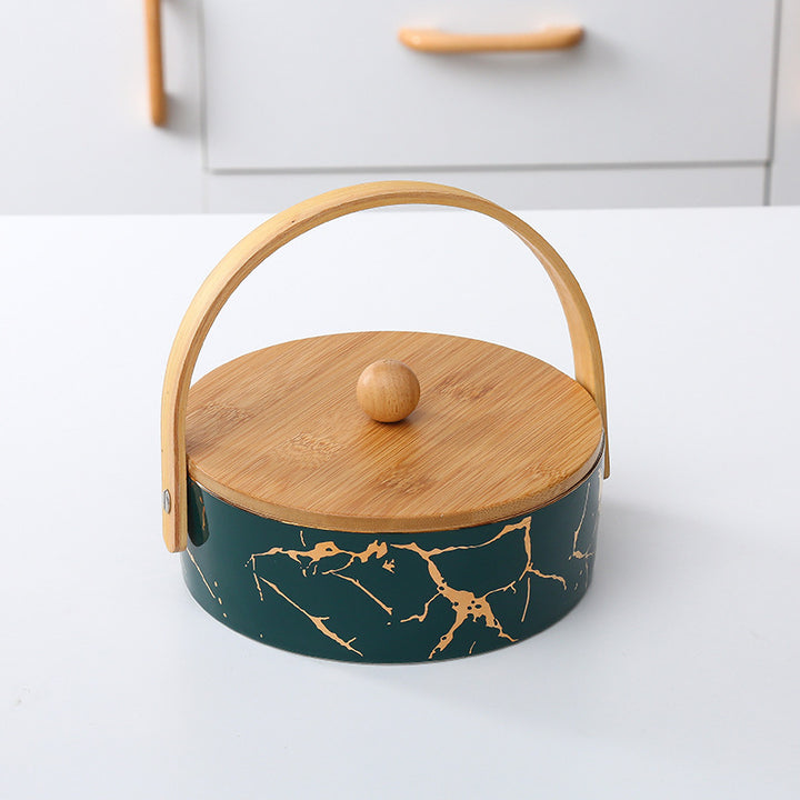 Kitchen organizer with bamboo handle and four-part insert, marbled snack bowl
