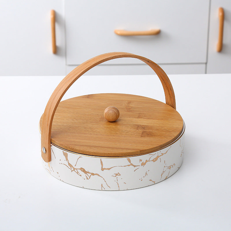 Kitchen organizer with bamboo handle and four-part insert, marbled snack bowl