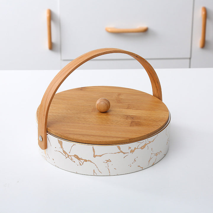 Kitchen organizer with bamboo handle and four-part insert, marbled snack bowl