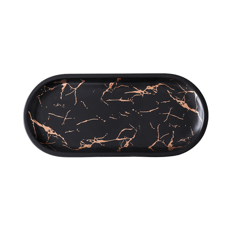 Oval serving tray made of melamine with glossy marble look and raised edge